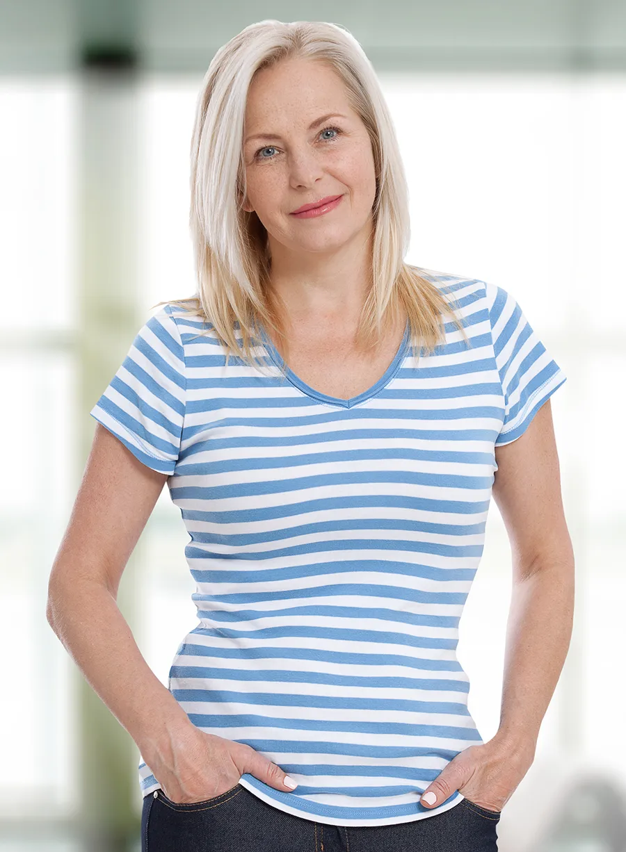 Woman standing confidently, at ease with herself